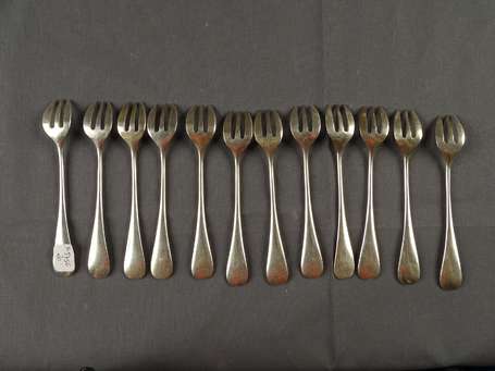 ERCUIS - Douze fourchettes à huitres en métal 