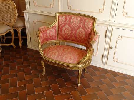 Fauteuil gondole en bois doré style Louis XVI