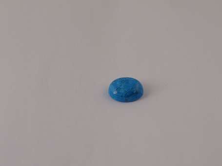 Cabochon de dolomite turquoise. P. : 4,5 ct.