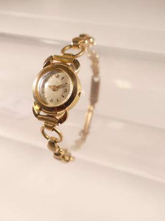 Montre bracelet de dame, le boitier en or jaune 