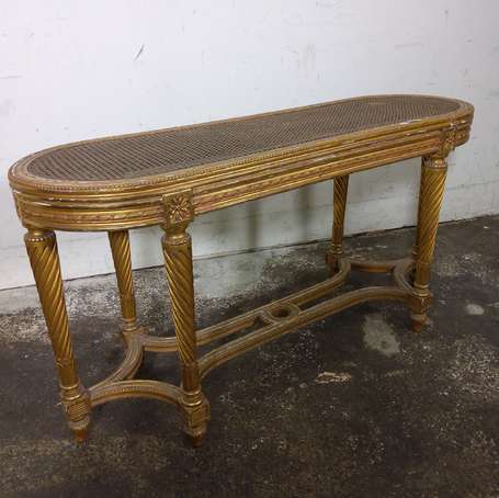 Banquette de piano en bois doré, les pieds à 