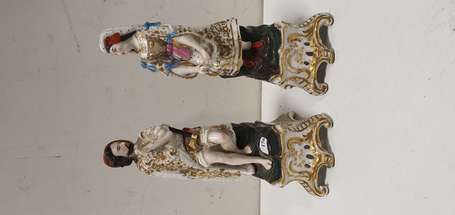 Deux encriers anthropomorphes en porcelaine 