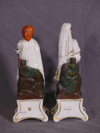 Deux encriers anthropomorphes en porcelaine 