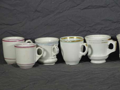 BRÛLOTS : 8 Tasses différentes en porcelaine.