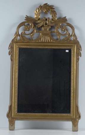 Miroir cadre doré, le bandeau sculpté et ajouré 