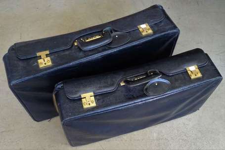 LANCEL - Deux valises en cuir noir, fermeture par 