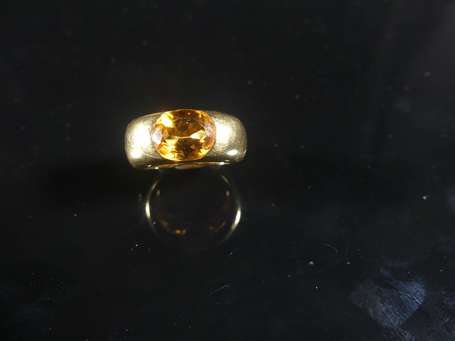 Bague jonc en or jaune 18K (750°/00) sertie d'une 