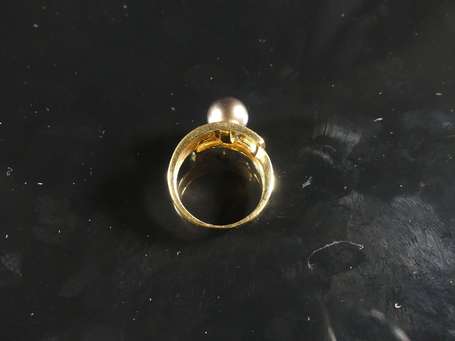 Bague en or jaune 18K (750°/00) montée d'une perle