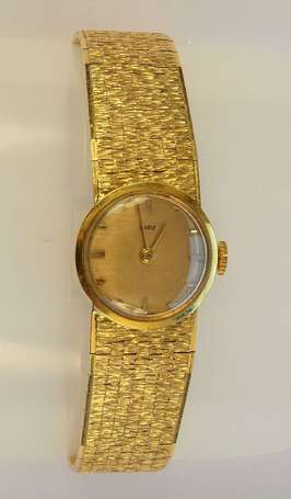 Montre de dame en or jaune 18K (750°/00) le 