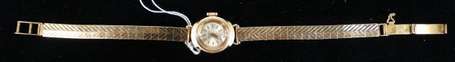 MONTRE BRACELET FEMME En or, le bracelet ruban 
