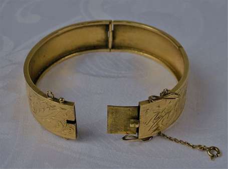 Bracelet jonc en or jaune 18K (750°/00) ciselé de 