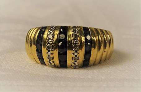 Bague jonc en or jaune 18K (750°/00) sertie de 