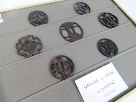 JAPON - Sept tsuba en fer à décor ajourés 