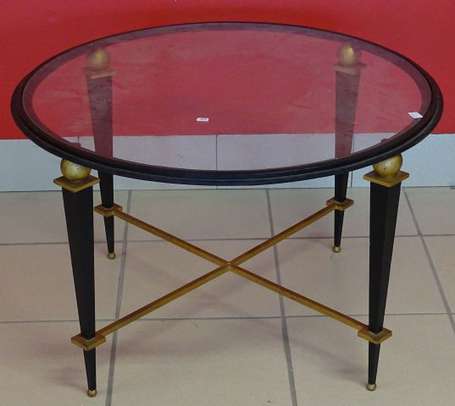 Table basse ronde, les pieds gaine de métal laqué 