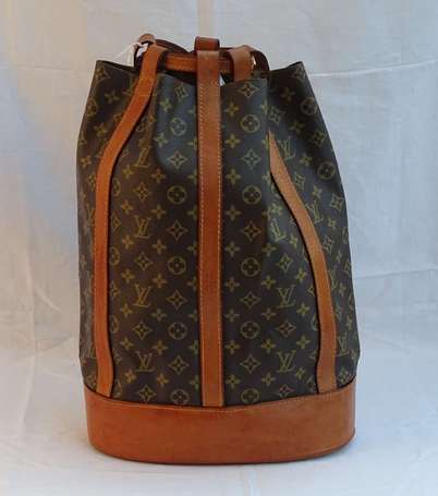 LOUIS VUITTON - Sac seau en toile monogram et cuir