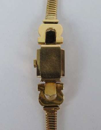 Montre bracelet de dame en or jaune 18K (750°/00),