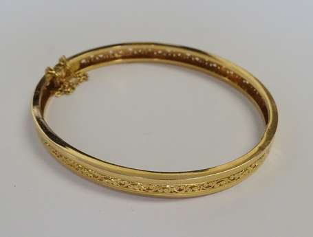 Bracelet jonc en or jaune 18K (750°/00) ciselé 