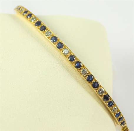 Bracelet demi-jonc en or jaune 18K (750°/00) serti