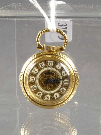 Petite montre de col en or jaune 18 K (750°/°°). 