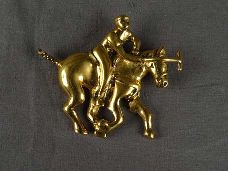 ROSSI - Broche en métal doré à motif d'un joueur 