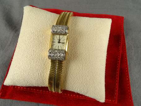 CARTIER - Monte bracelet femme en or 18K (750°/00)