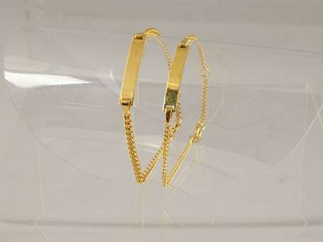 Deux Bracelets gourmettes en or jaune 18 K 