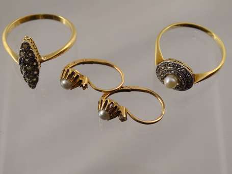 Bague en or 750°/°°°, la table ronde montée d'une 
