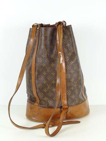 LOUIS VUITTON. Sac à dos Randonnée en toile 