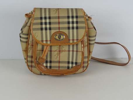 	BURBERRY. Sac à dos en toile enduite tartan et 