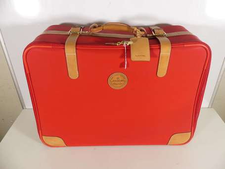 LANCEL Valise en toile rouge à parements de cuir 