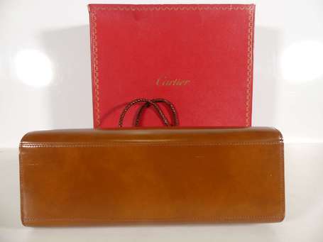 CARTIER - Sac droit en cuir rigide fauve, à un 