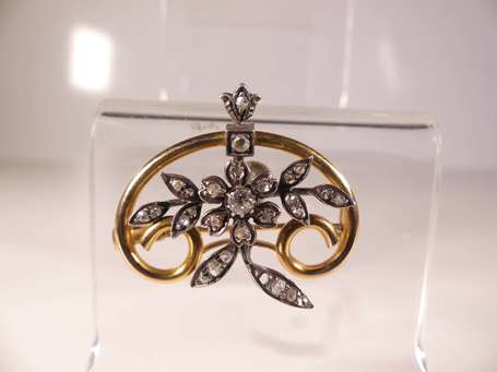 Broche en or jaune 18K (750°/00) et argent à décor