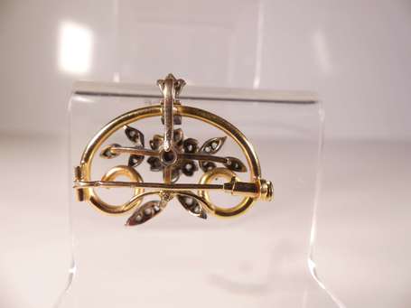 Broche en or jaune 18K (750°/00) et argent à décor