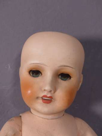 Bébé tête porcelaine marquée en creux 