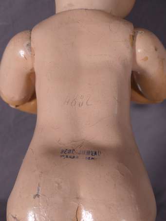 Bébé tête porcelaine marquée en creux 