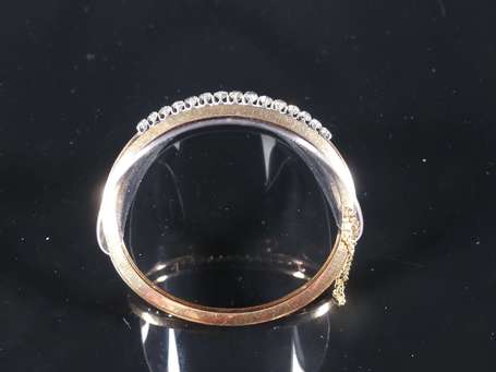 Bracelet jonc en or rose 18K (750°/00) centré d'un