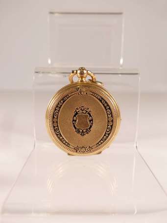 Montre pendentif en or jaune 18K (750°/00), le dos