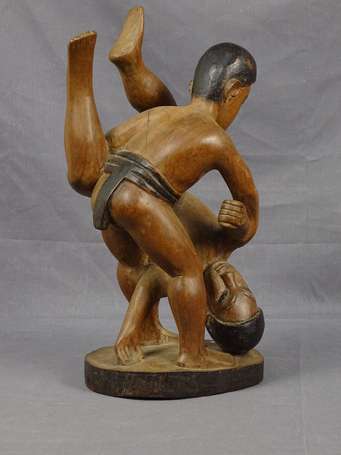 Ancienne scène de lutte traditionnelle malgache en