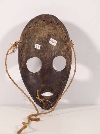 Ancien masque de coureur en bois dur, taille 