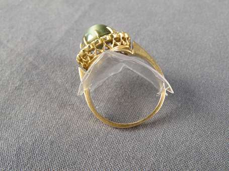 Bague en or jaune 18 k (750°/°°) montée d'un 