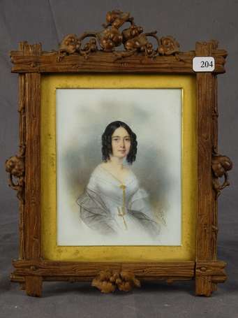 Ecole XIXème siècle Portrait de femme aux 