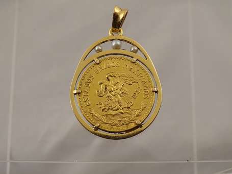 Médaillon pendentif en or 750 °/°°° il est monté 